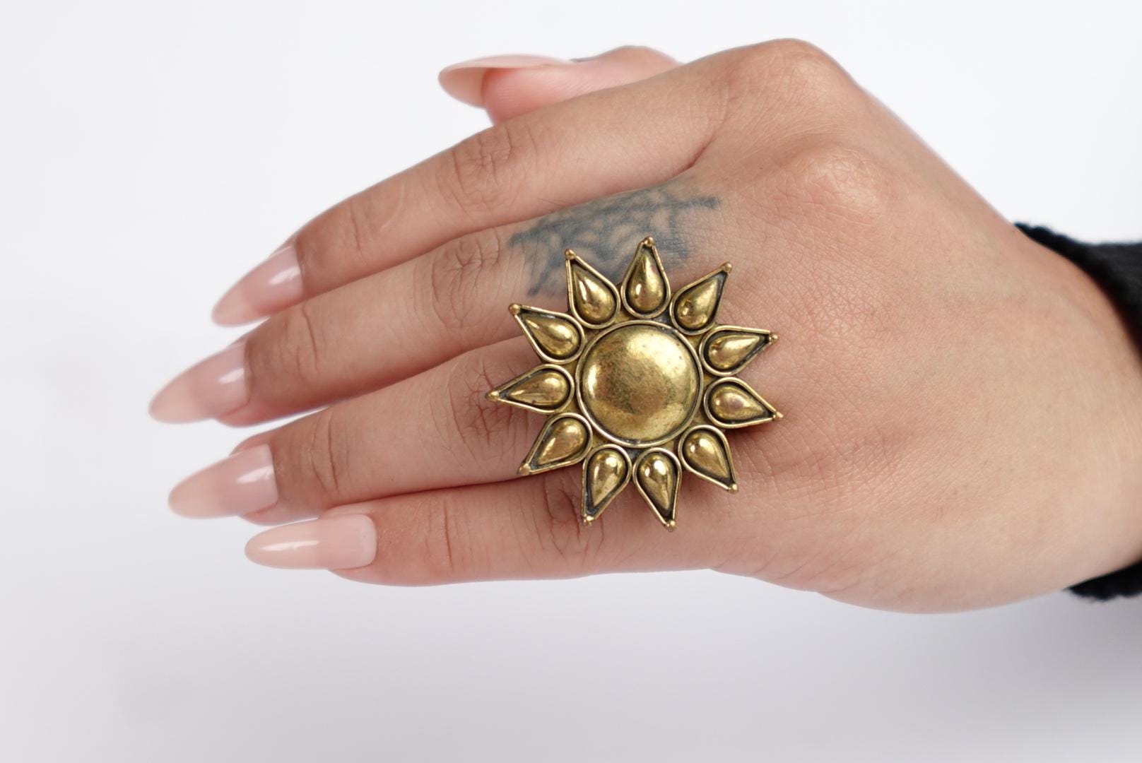 Radiant Sunburst Statement Ring in Antique Gold