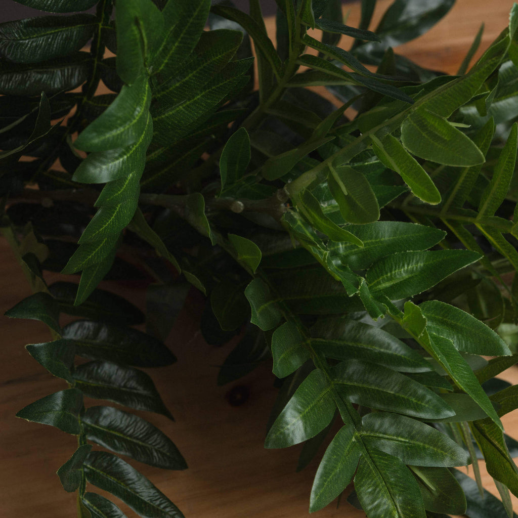 Realistic pistachio greenery stem in rich green, perfect for vases or centerpieces, made of durable premium plastic. by RoomLondon at brixbailey.com