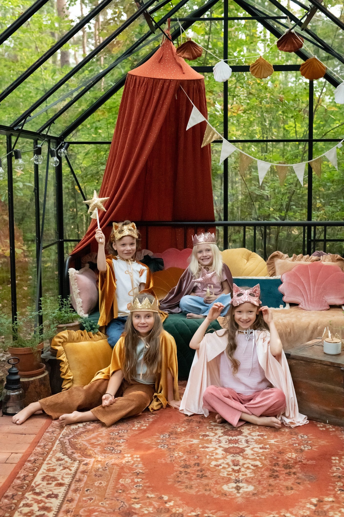 gold glitter cat mask for kids shown on a table, highlighting its durable velvet and sequin construction