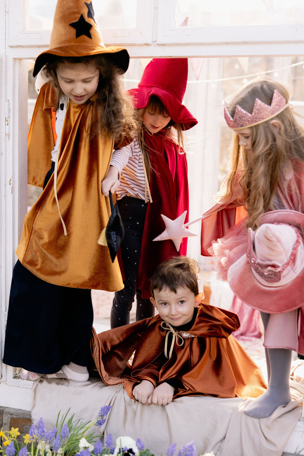 confident child wearing a sparkling pink velvet cat mask for imaginative play