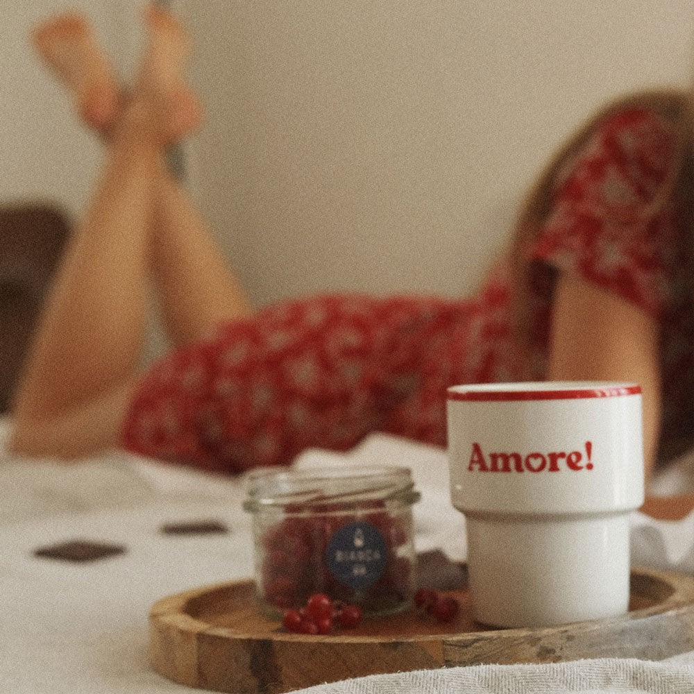 elegant amore ceramic mug with refined italian design on a minimalist marble table