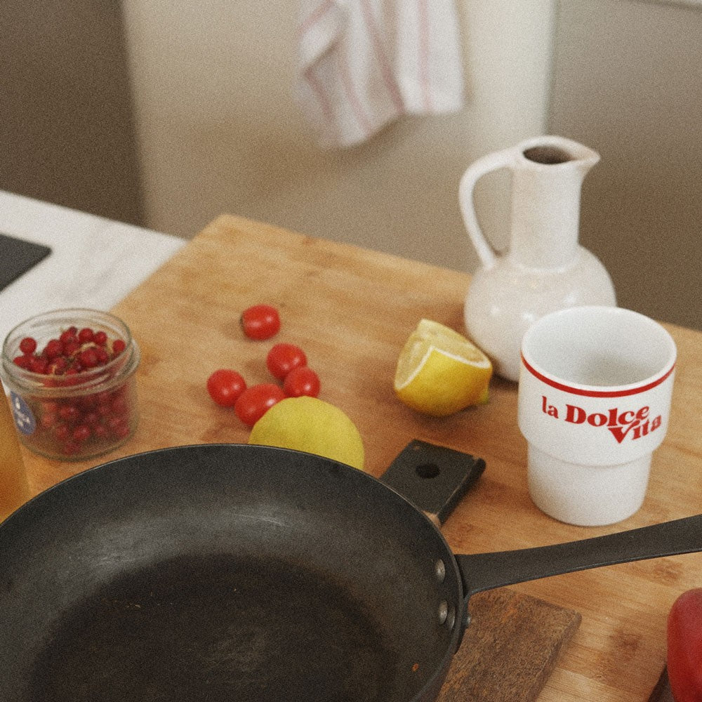 elegant italian ceramic mug with la dolce vita design in soft morning light