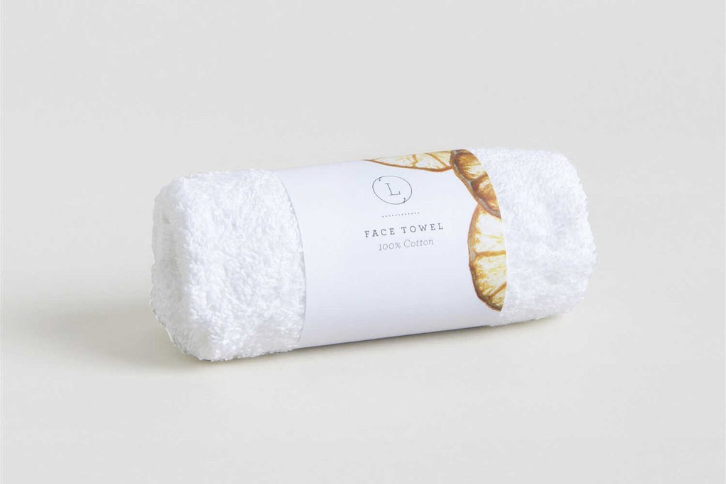 a functional and practical view of the citrus cheer up gift basket's contents laid out for a recovery care package