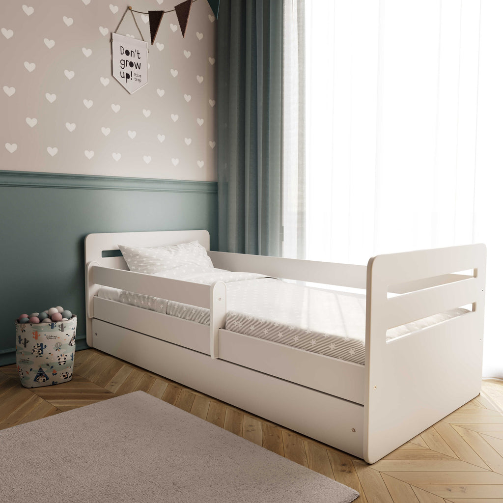 confident front view of the tomi white kids bed with its sleek safety guardrail