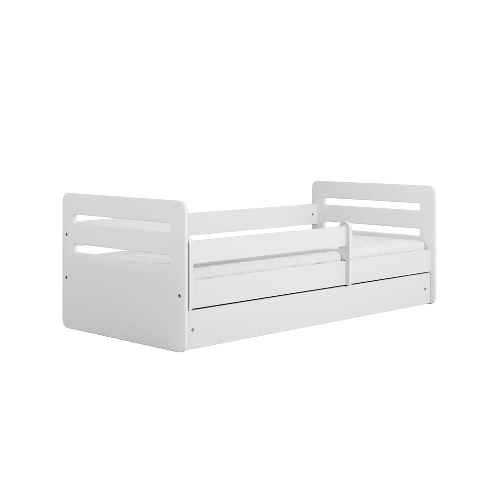 tomi white kids bed with optional storage drawer in a bright, tidy nursery setting