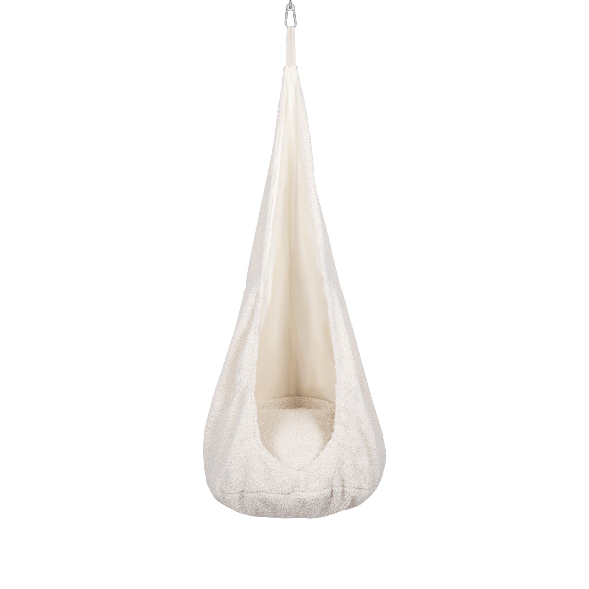 a bold statement in home decor - the textured cocoon swing for kids hangs confidently in a modern room
