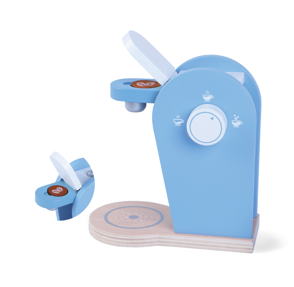 playful toddler pretending to be a barista with a wooden coffee machine and pods
