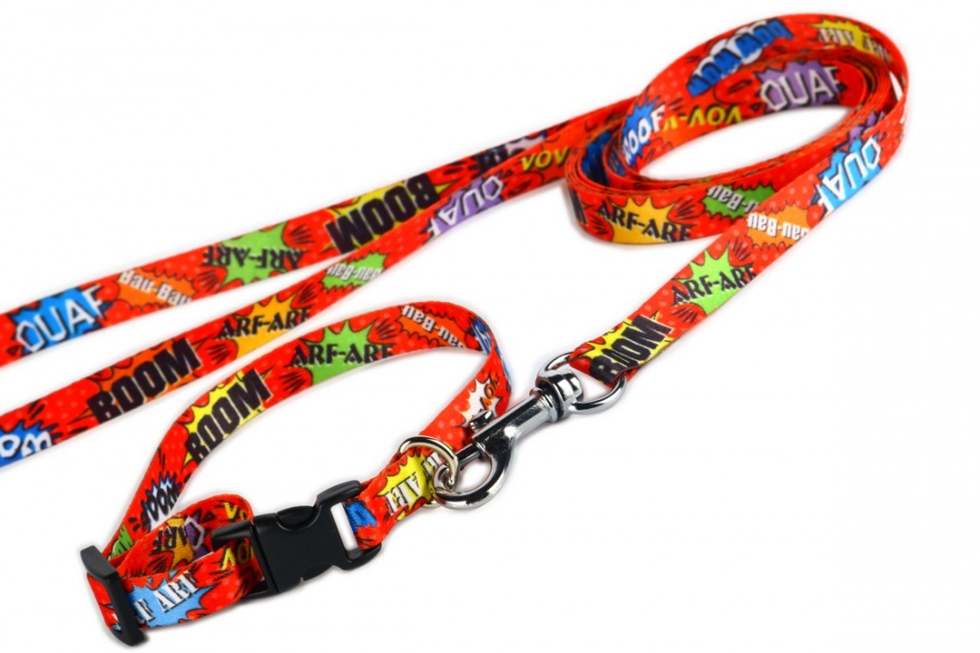 bold red graffiti dog collar with a durable nickel-plated buckle in dramatic studio lighting