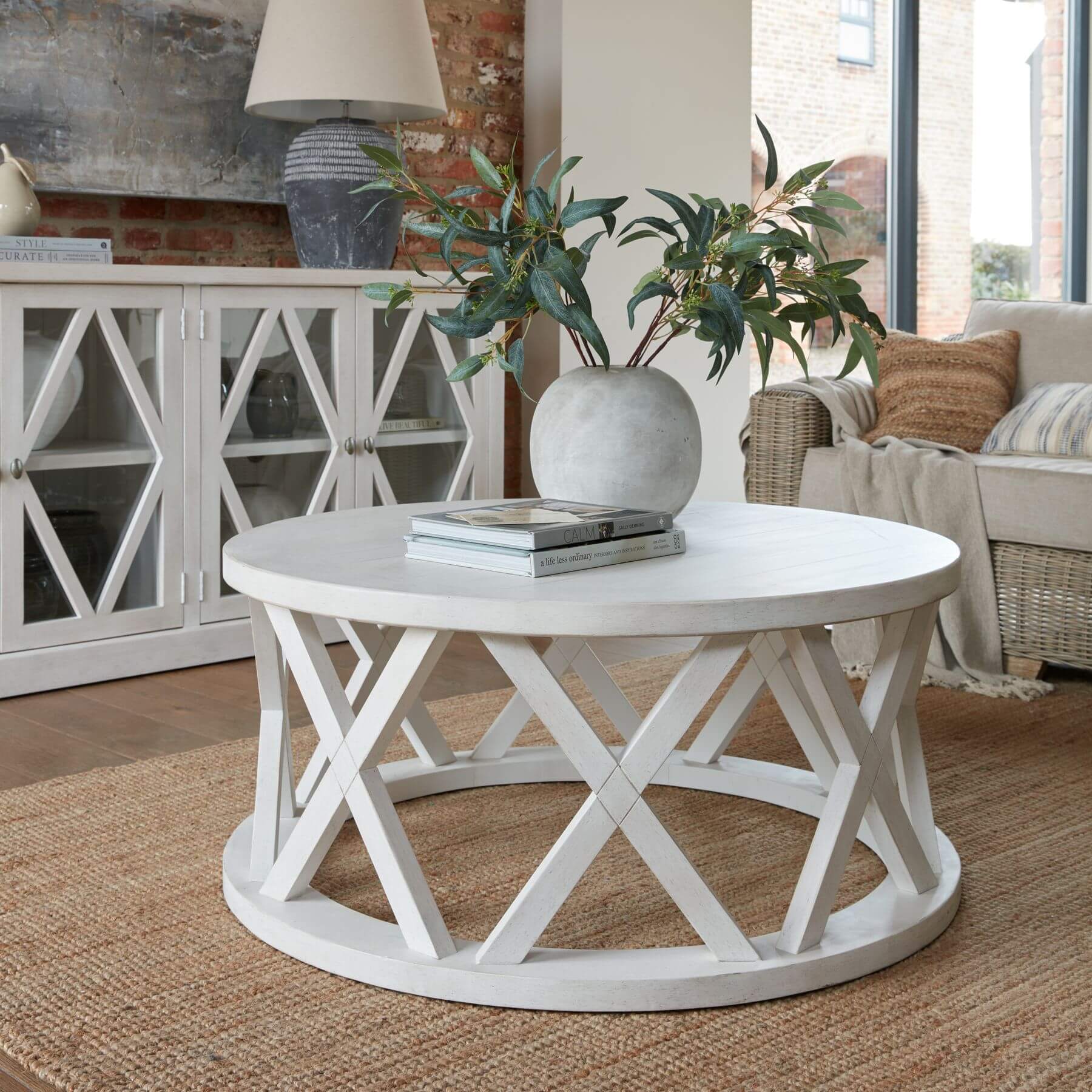 Distressed white pine round coffee table with lattice pattern, rustic-modern design, 100cm diameter by RoomLondon at brixbailey.com