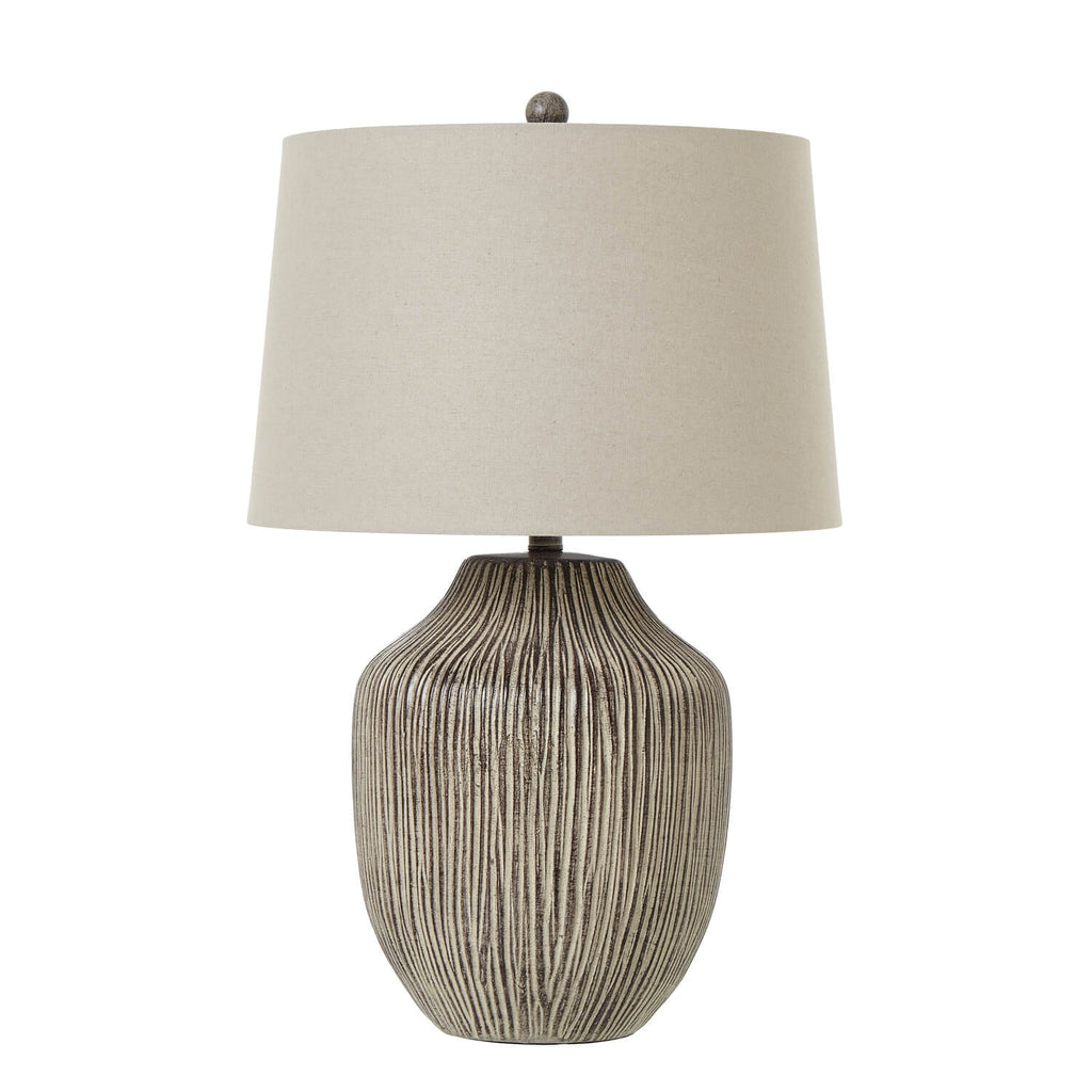Handcrafted ochre table lamp with textured resin base and linen shade, warm earthy glow for rustic or modern decor. by RoomLondon at brixbailey.com
