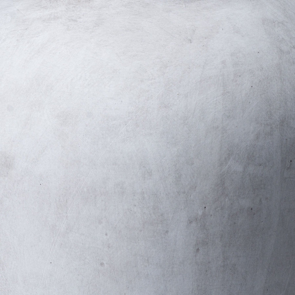 Handcrafted stoneware vase in natural hue with textured surface, perfect for modern home decor. by sostter at brixbailey.com