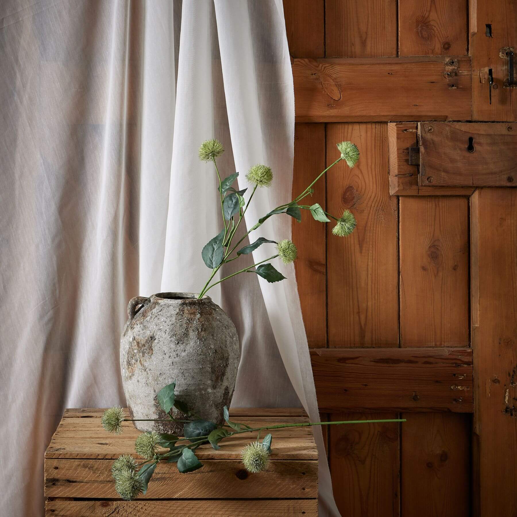 Artificial thistle stem with spherical head, natural green tones, lifelike texture, 32-inch height for home decor. by sostter at brixbailey.com