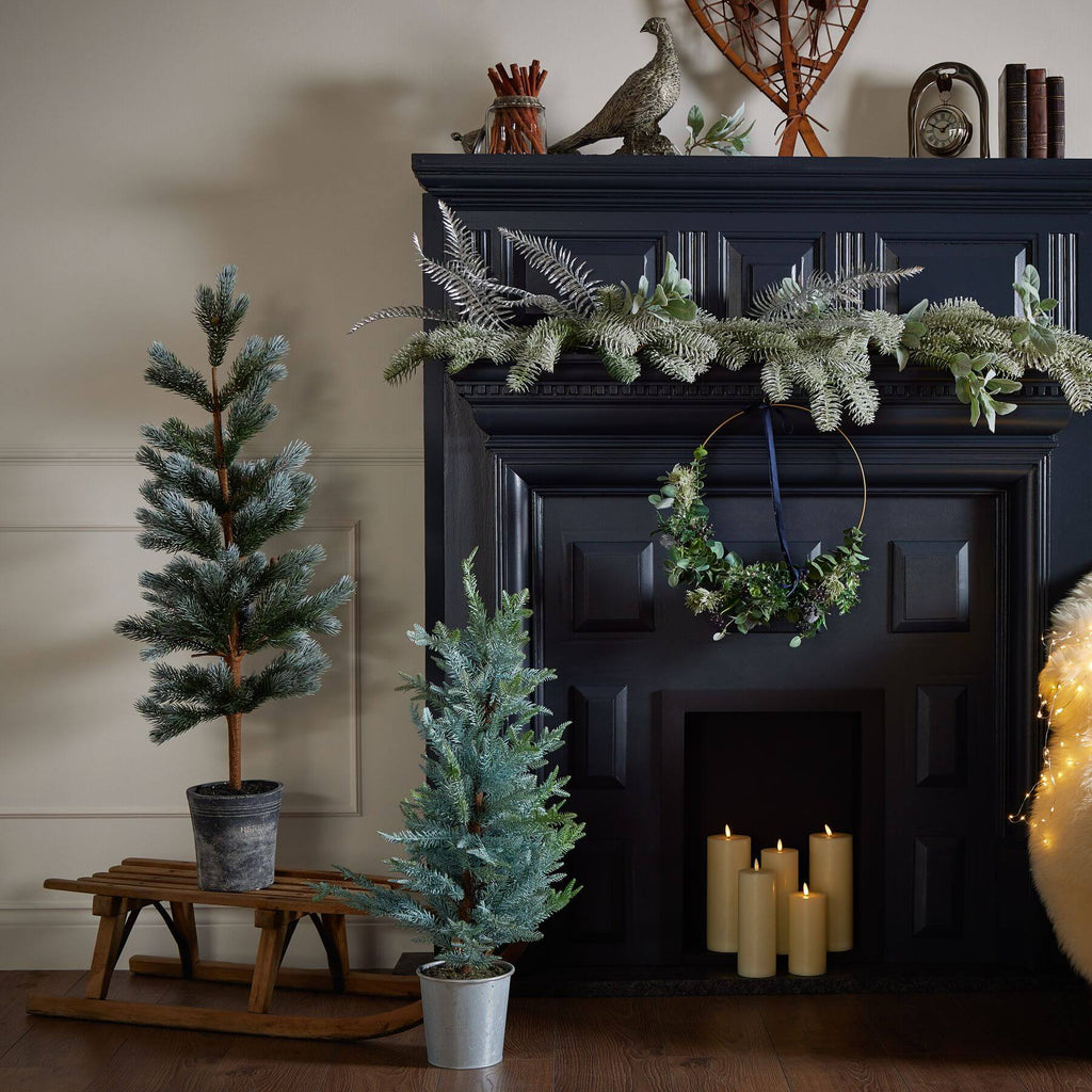 120cm artificial fir tree with lifelike needles and pinecones in natural green, displayed in neutral stone base by RoomLondon at brixbailey.com