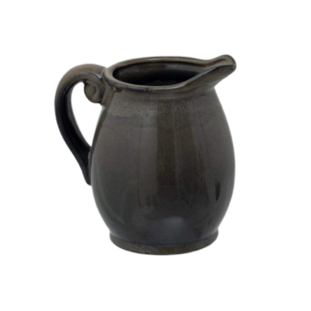 Handcrafted Mediterranean ceramic vase with reactive glaze in organic green and charcoal, unique textured surface. by Sostter at brixbailey.com