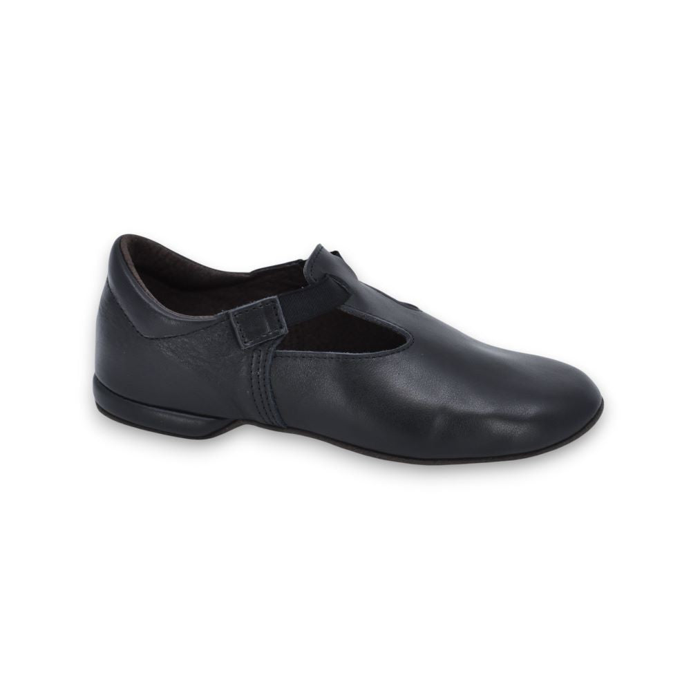kergatsi dance shoes in a warm glow, showcasing the soft leather and portable textile bag
