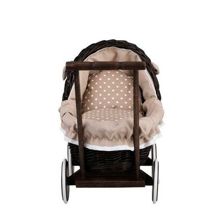 elegant dark wicker doll pram with beige bedding in a cozy bedroom setting