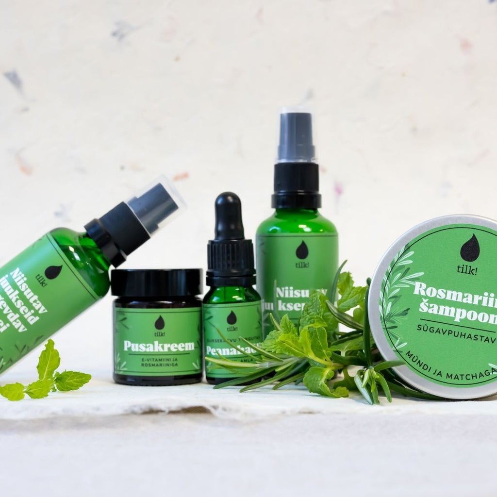 bold close-up of nourishing detangling cream with vitamin e and rosemary for silky hair