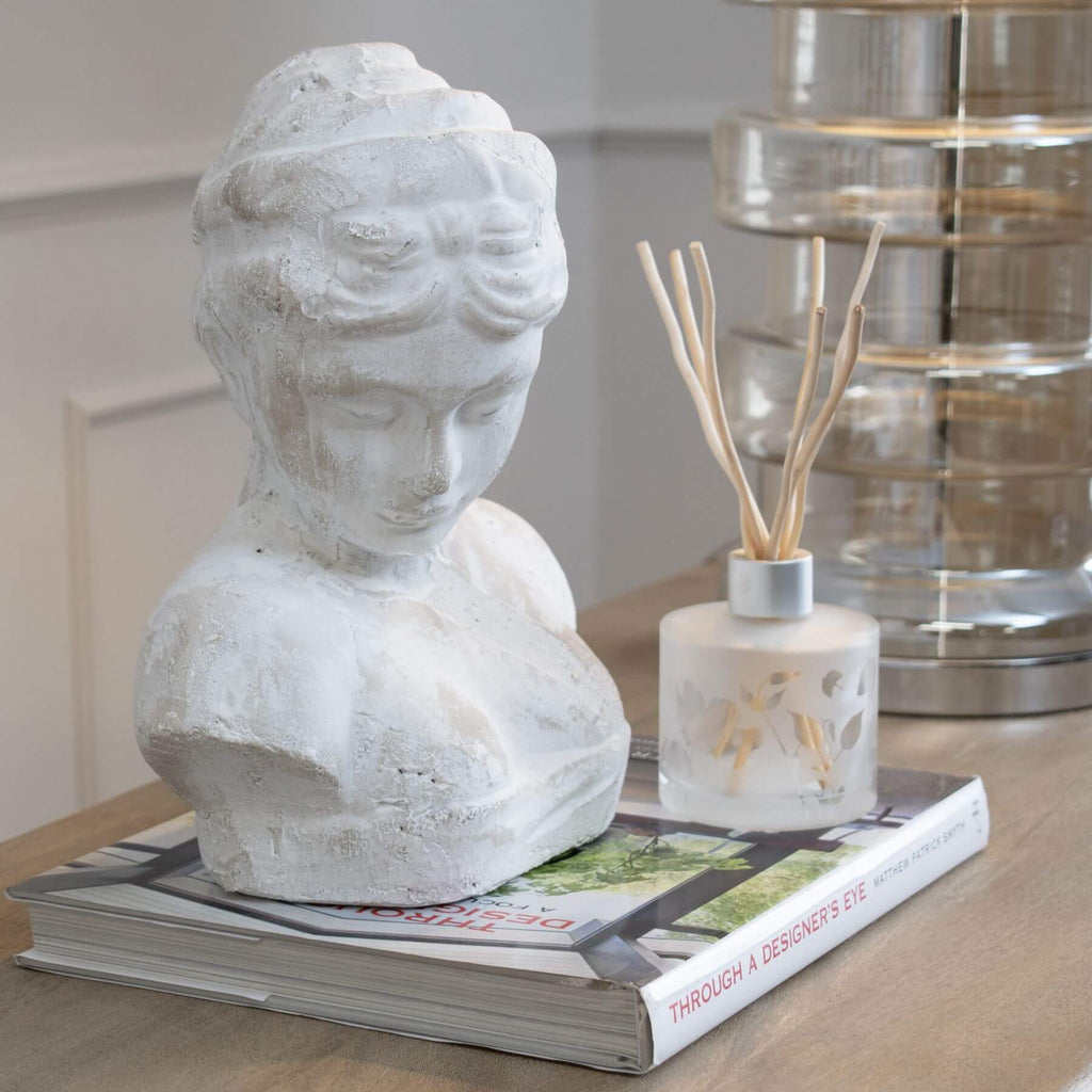 Stone-effect cream decorative bust with intricate texture, 29cm height, for modern or classical interiors. by Sostter at brixbailey.com
