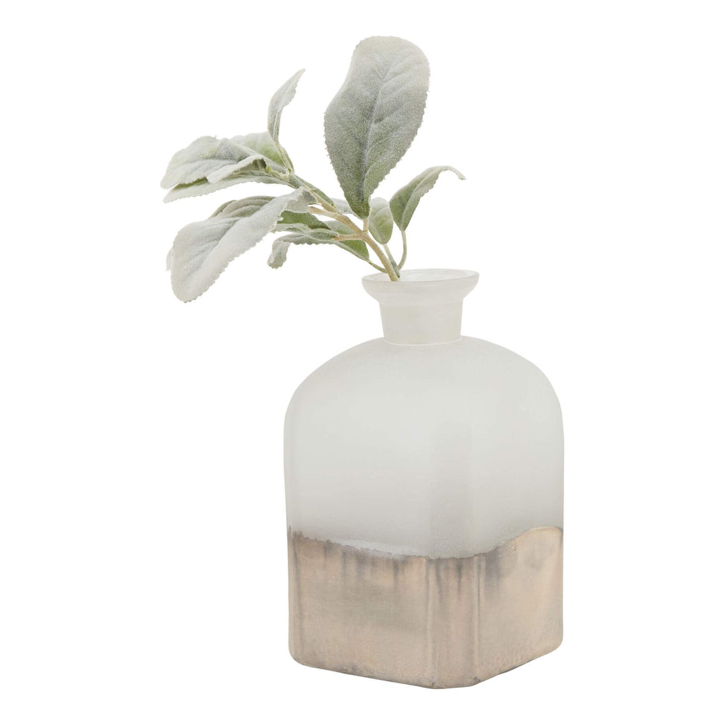 Handcrafted brass candle holder vase with burnished finish, aged detailing, and warm grey glass for elegant home decor. by RoomLondon at brixbailey.com