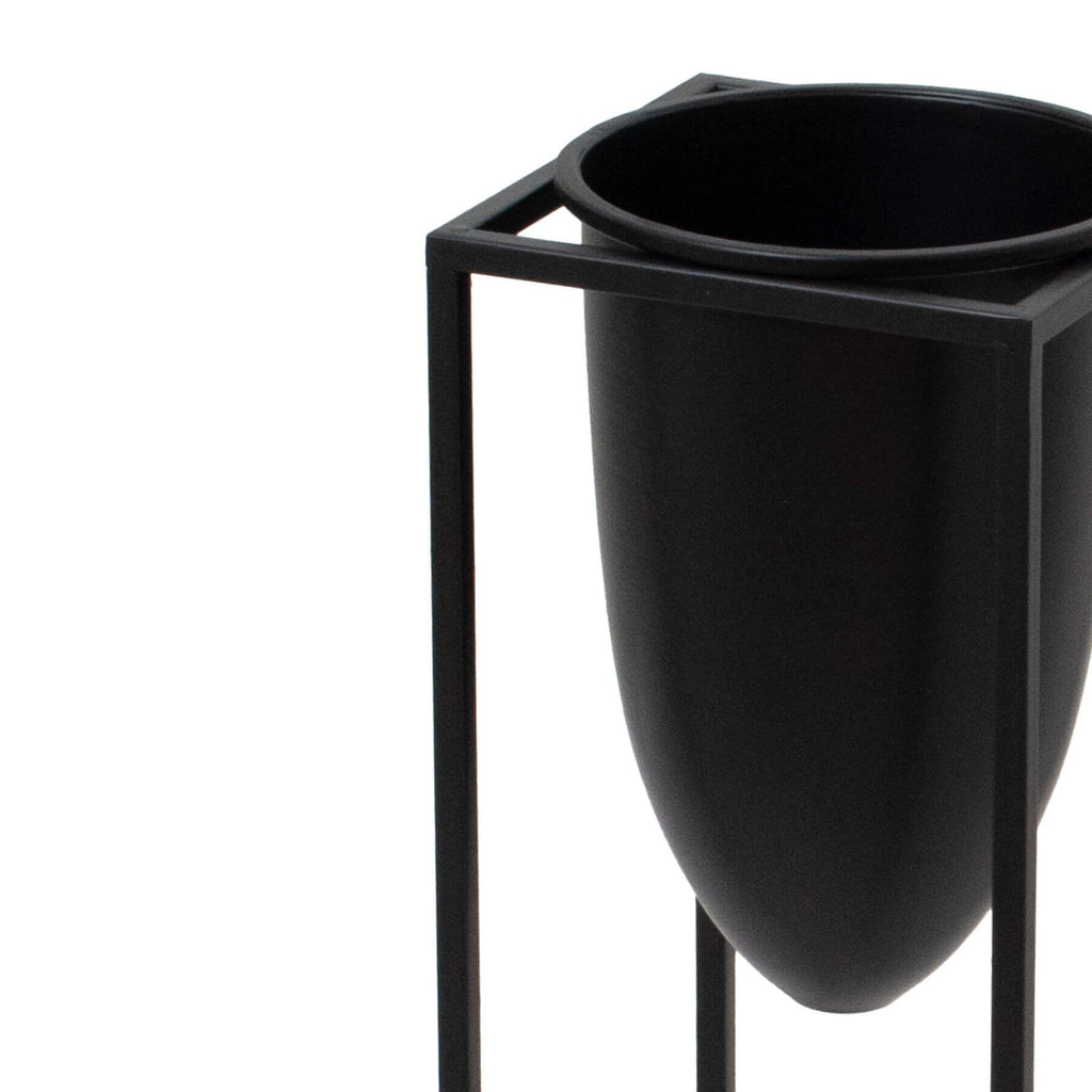 Matte black industrial modern metal planter with sleek bullet design, 62cm tall, for minimalist interiors by RoomLondon at brixbailey.com