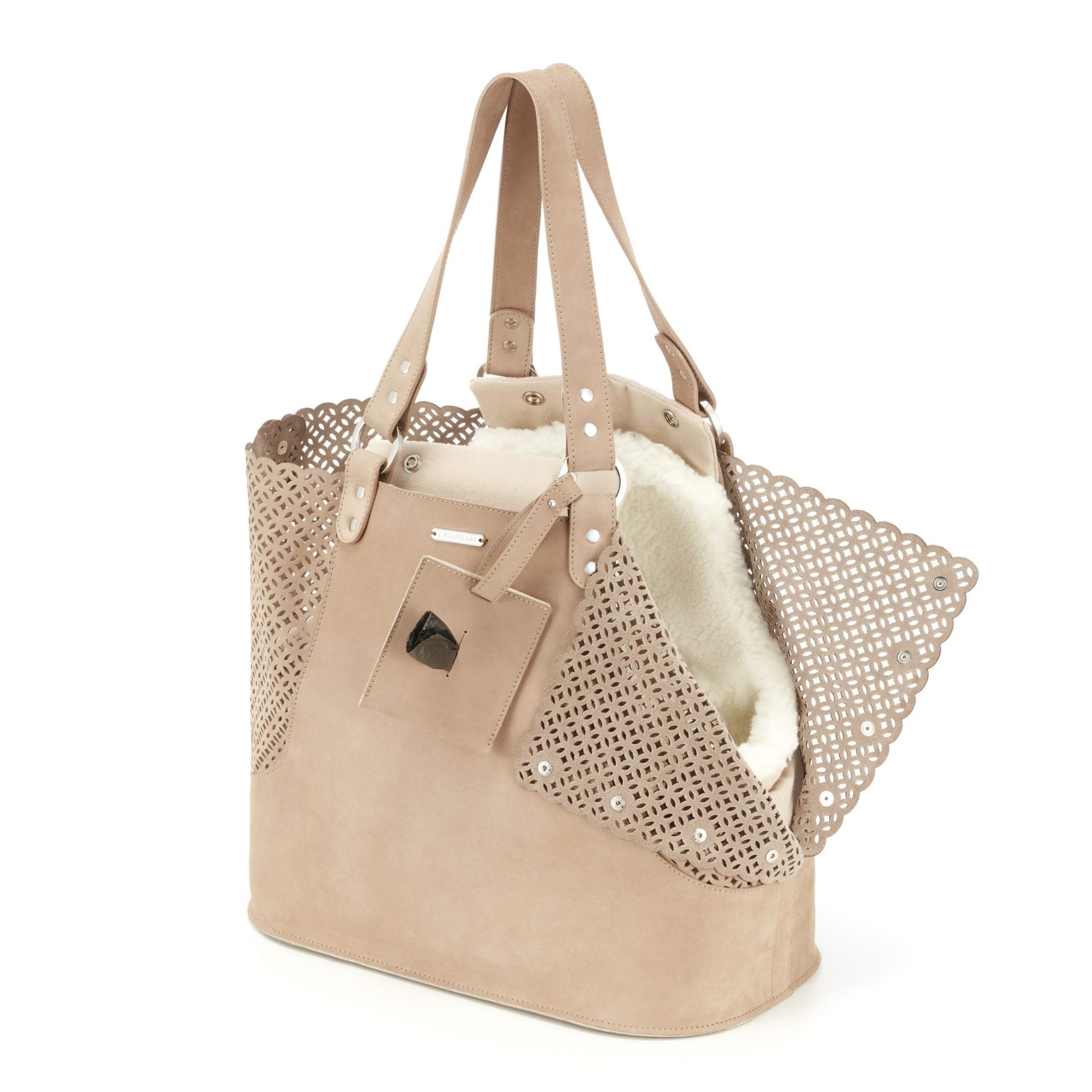 elegant nude nubuck leather dog carrier with a refined cotton insert on a marble surface