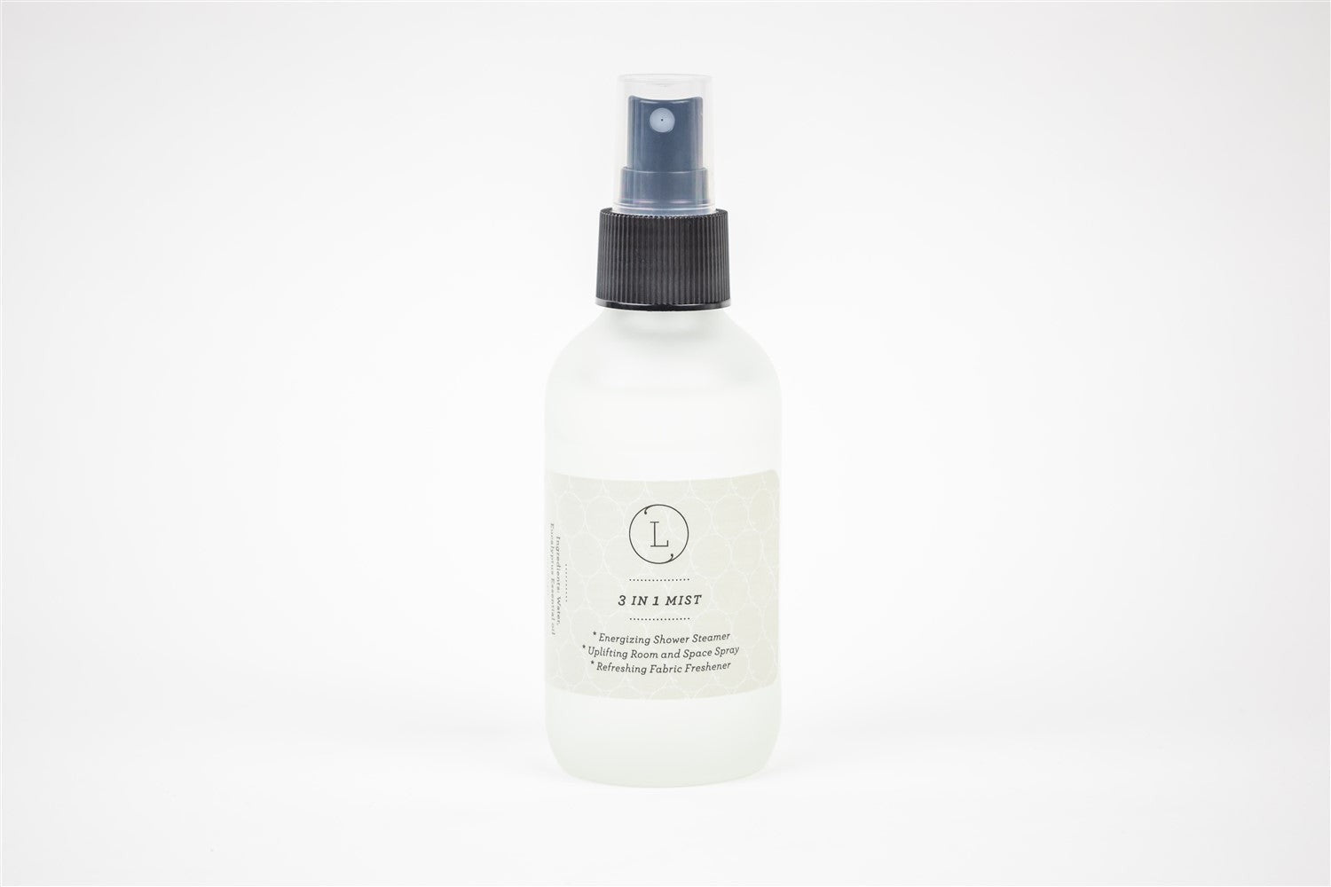 elegant frosted glass bottle of eucalyptus room spray on a marble surface, a sophisticated gift
