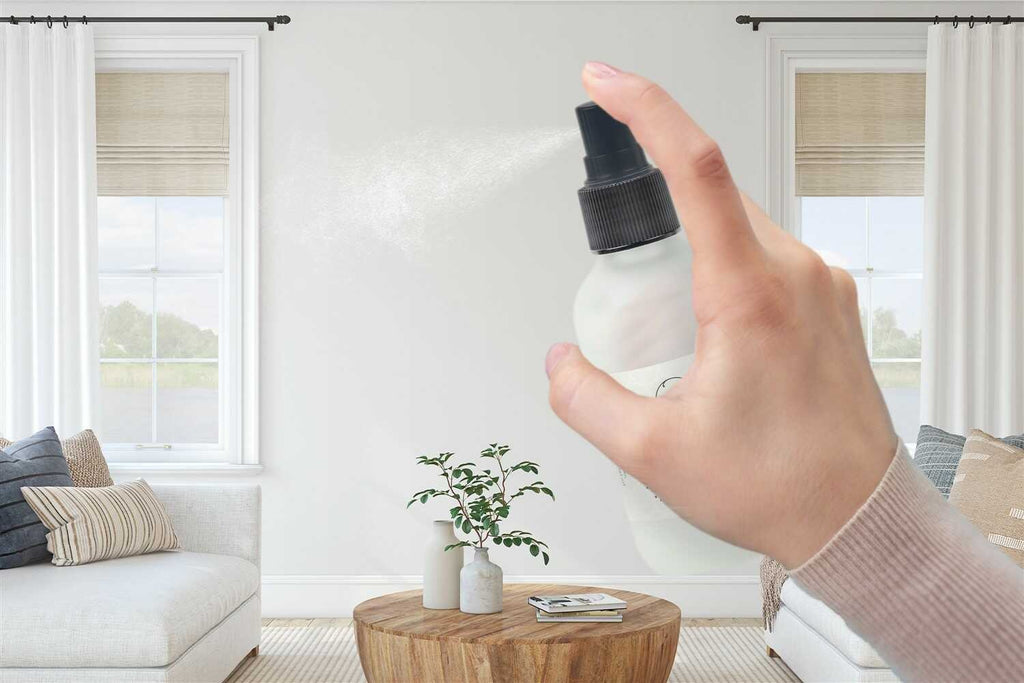 eucalyptus room spray bottle on a bathroom counter with natural morning light