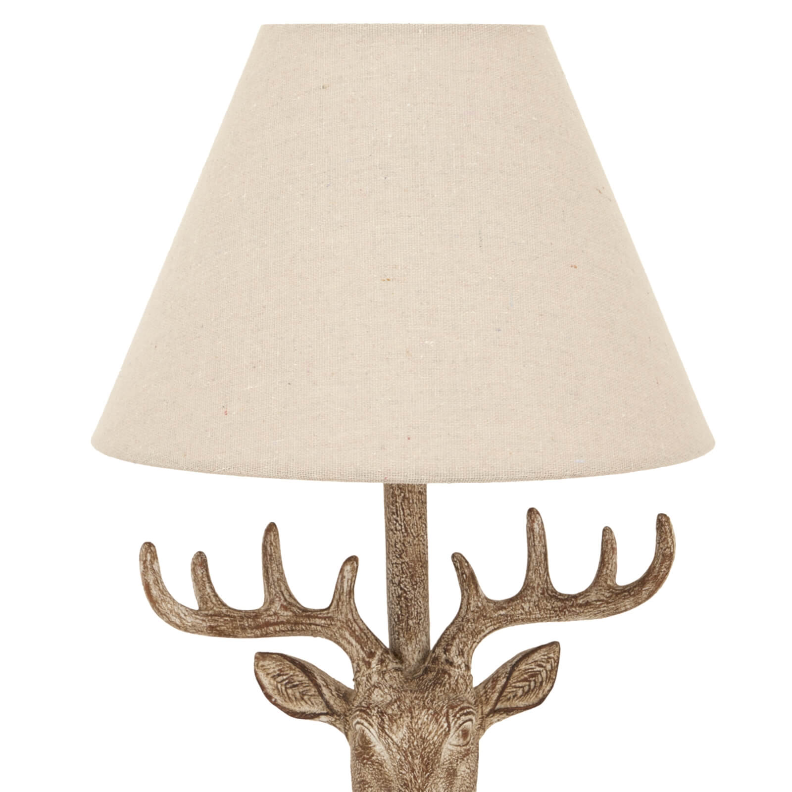Handcrafted stag head table lamp with stonewashed resin base and natural linen shade in rich brown. by sostter at brixbailey.com