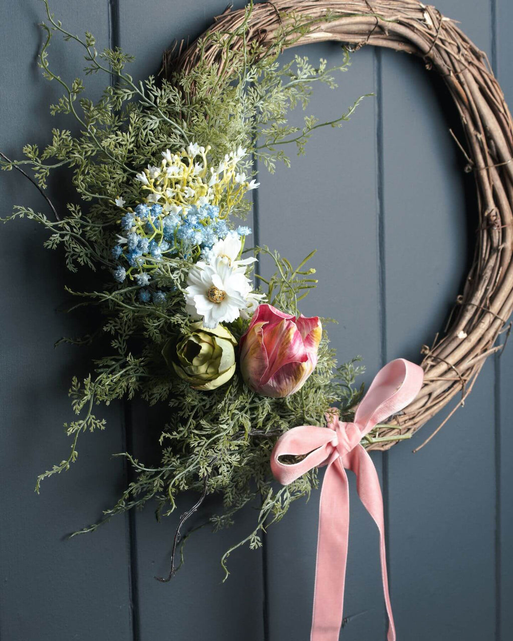 Lush artificial asparagus fern bunch with feathery green fronds, perfect for home decor or floral arrangements by Sostter at brixbailey.com