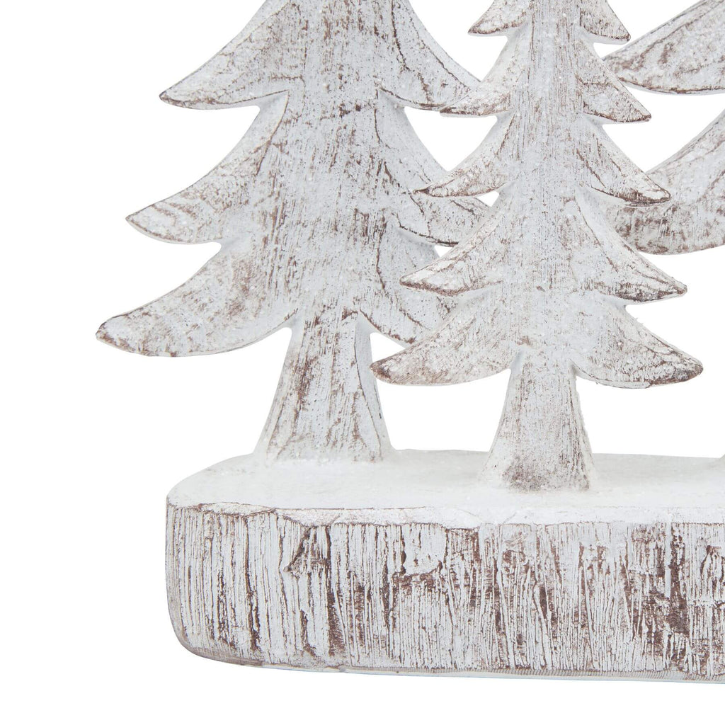 Handcrafted white resin winter pine tree sculpture set with snow-dusted branches, perfect for holiday decor. by RoomLondon at brixbailey.com