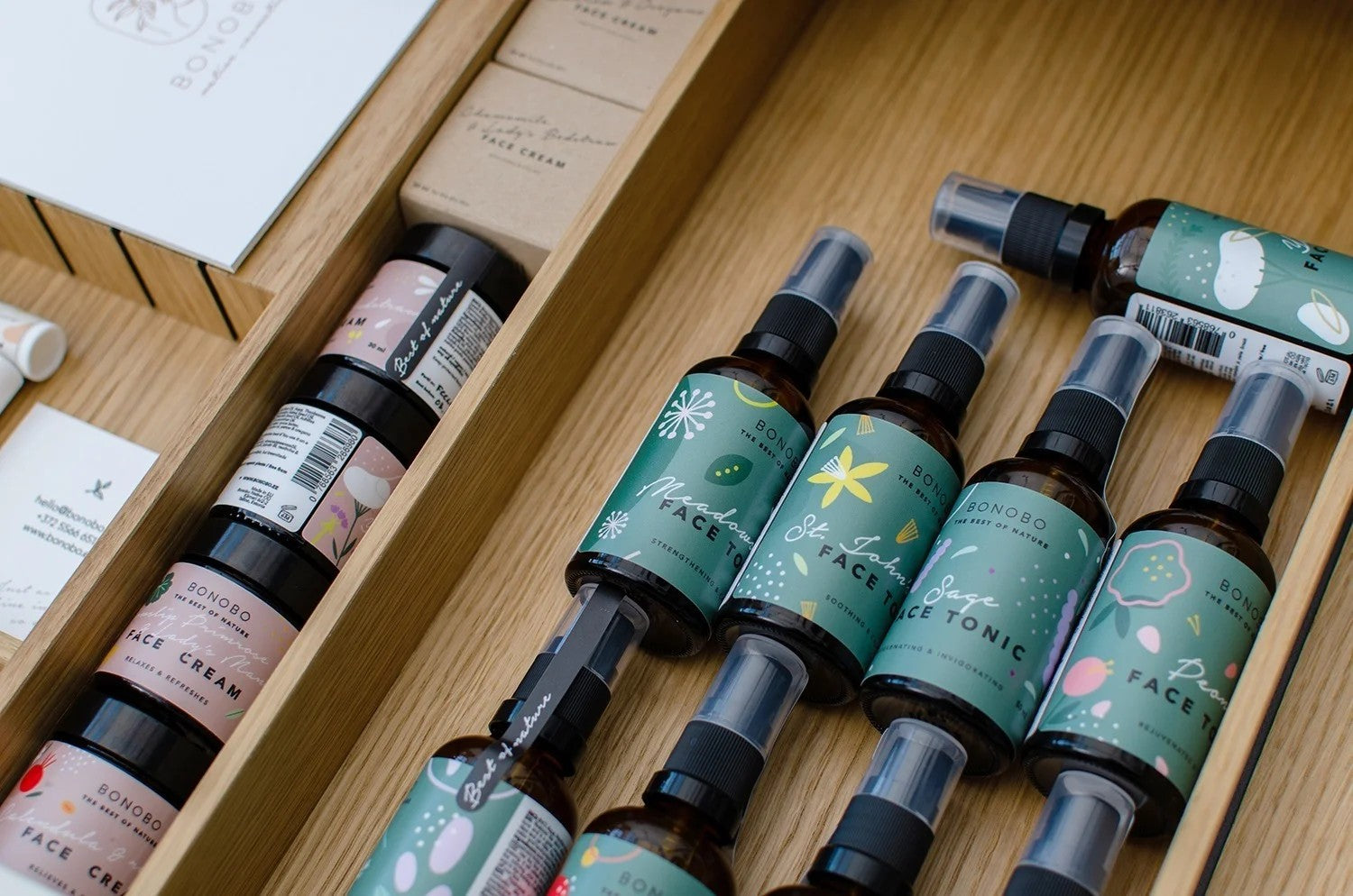 a gentle mist of lemon balm face tonic glowing in soft morning light