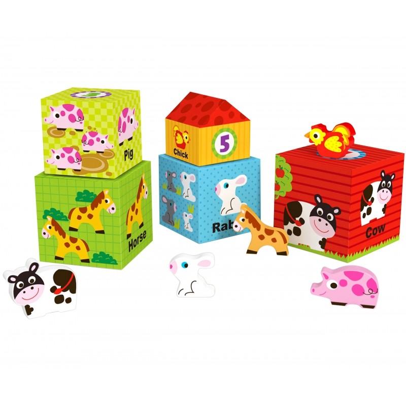 a toddler's hand stacking a farm cube puzzle with a wooden cow peeking out