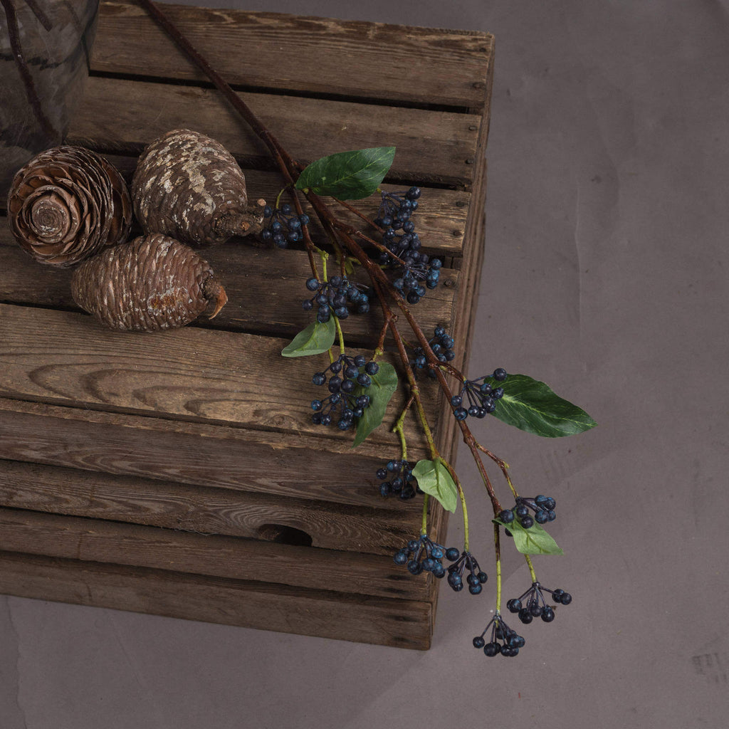 Handcrafted indigo artificial berry stems, 80cm tall, deep blue with realistic texture for floral arrangements. by sostter at brixbailey.com