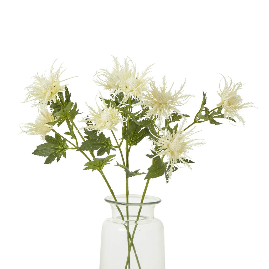 Cream faux sea holly spray with lifelike texture, 67cm tall, for coastal-inspired home decor by sostter at brixbailey.com