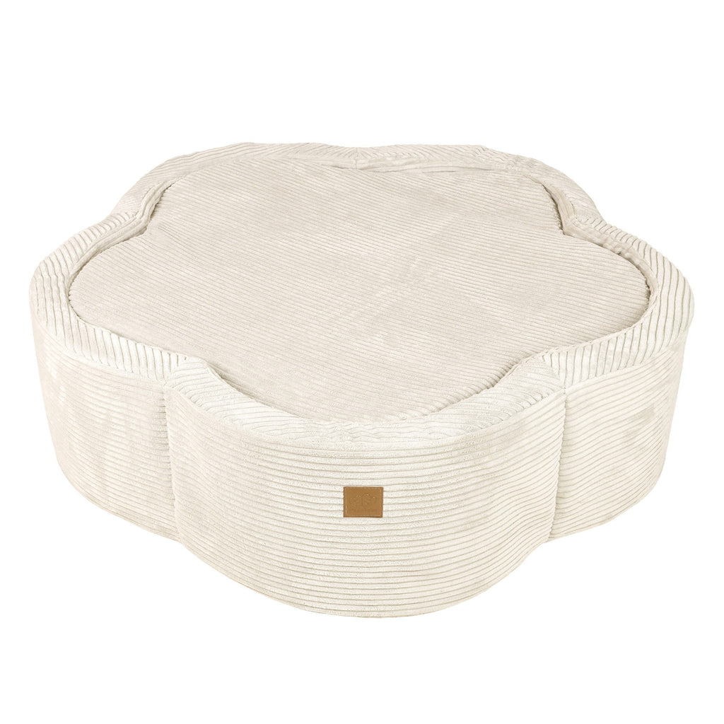 a soft vanilla flower baby ball pit in a serene nursery setting
