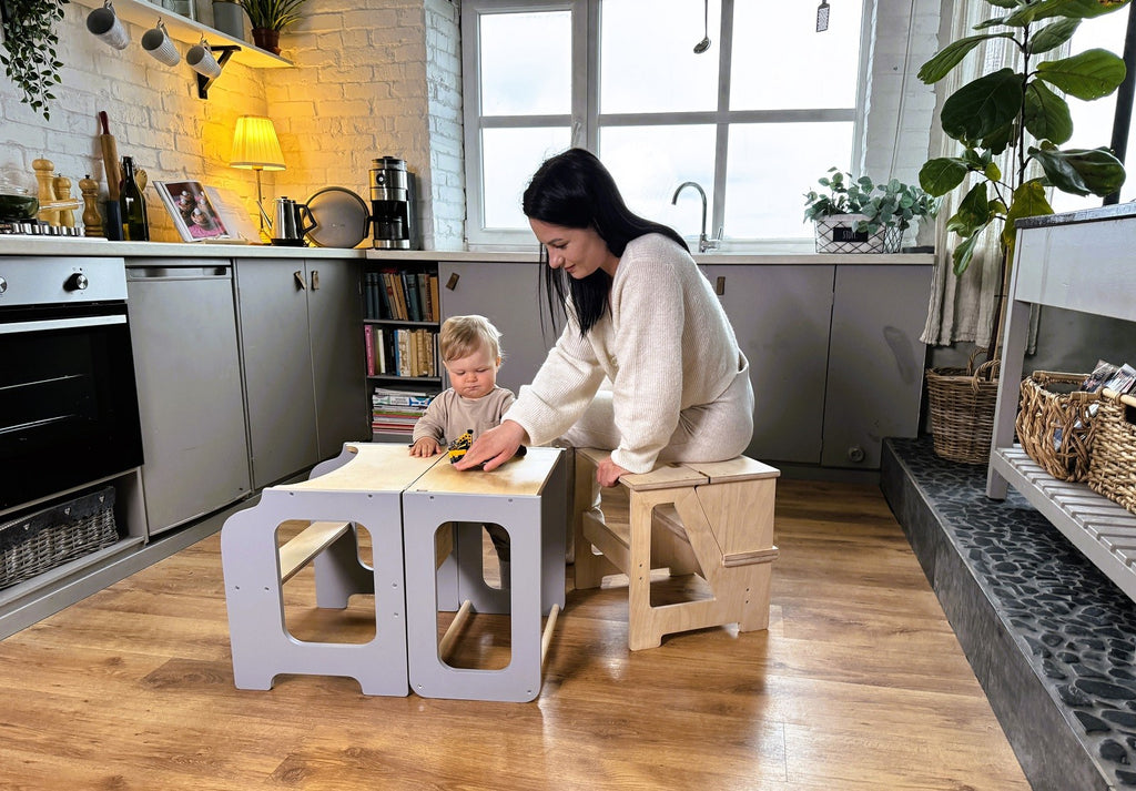 a soft-lit solid wood step stool and seat folded in a cozy nursery corner