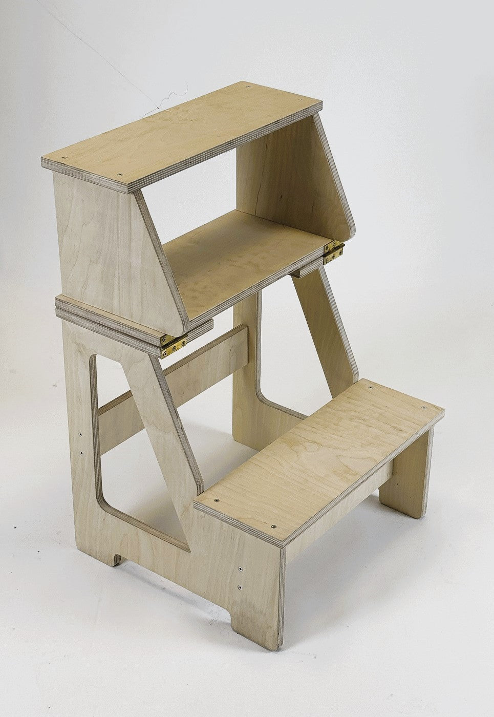 versatile solid wood step stool in a warm, sunlit family kitchen setting
