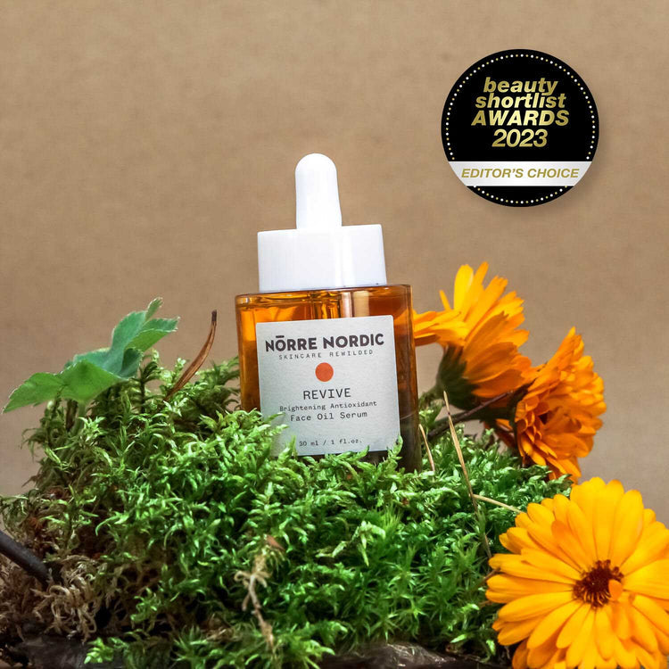 nörre nordic brightening face oil serum dropper in use on practical skincare shelf
