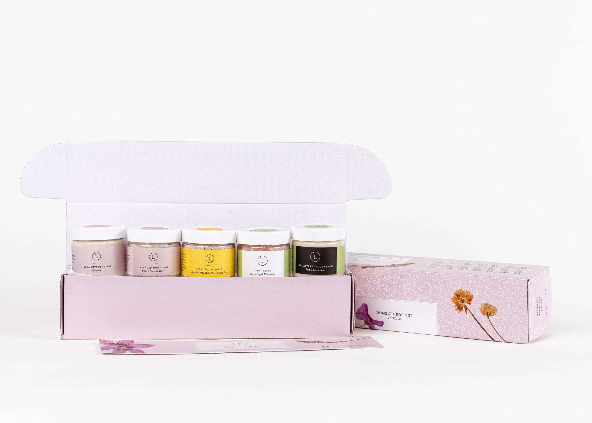 softly lit luxury home spa gift set with natural shea butter cream and foot salt