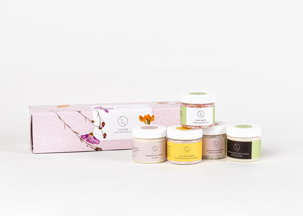 bold display of a complete luxury home spa gift set with body scrub and shea butter cream