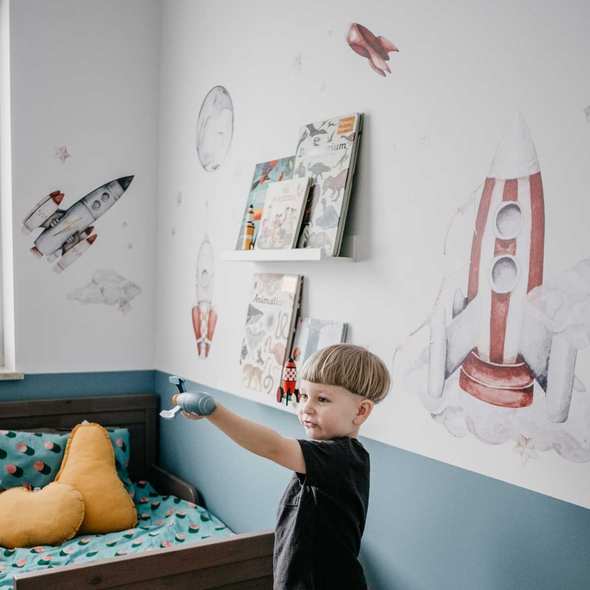 playful watercolor rocket wall sticker set with planets and stars for a kids room