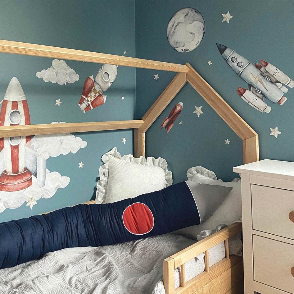 bold watercolor rocket wall sticker set creating a cosmic adventure scene for a child's room