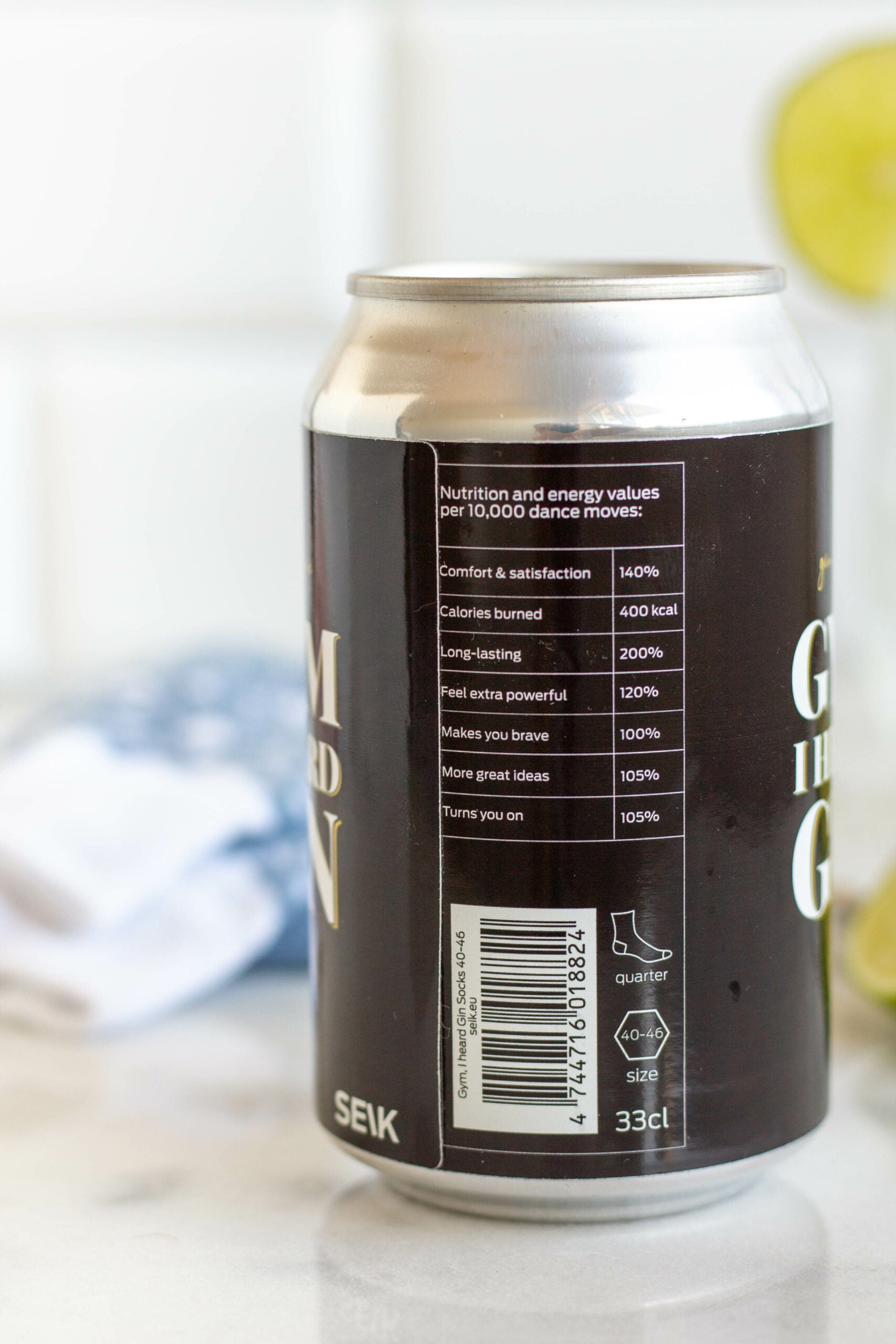 bold close-up of stylish gin and tonic socks on a gym floor, confident lifestyle statement