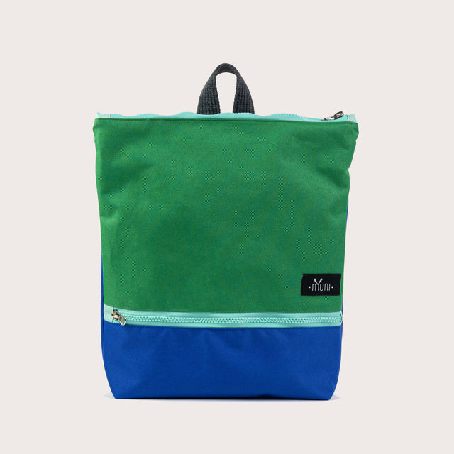 Green+Blue Waterproof Backpack – Durable & Ergonomic Design by Muni at www.brixbailey.com