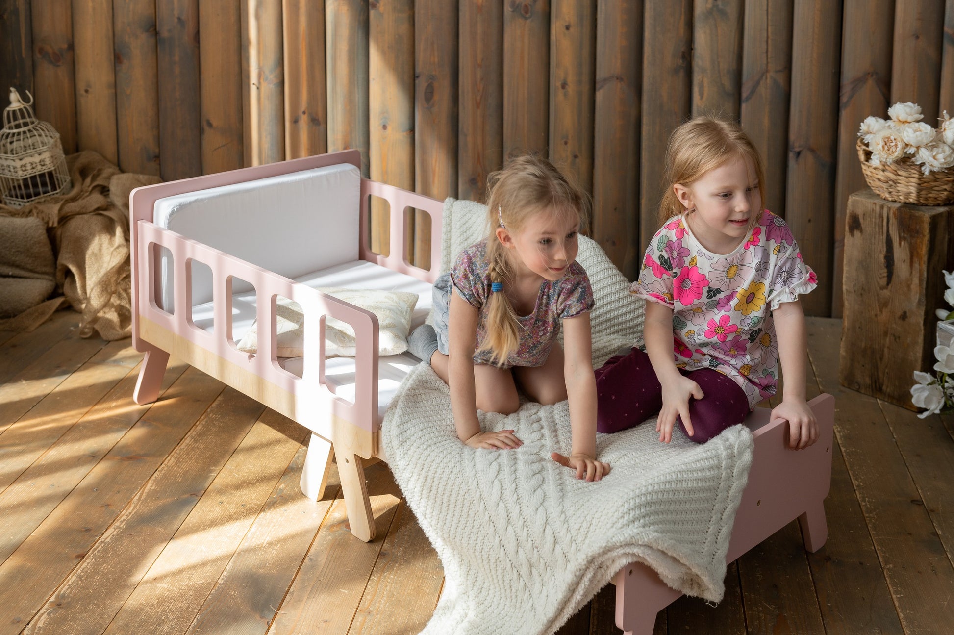 elegant latvian-made growing bed for kids in a refined, minimalist nursery setting