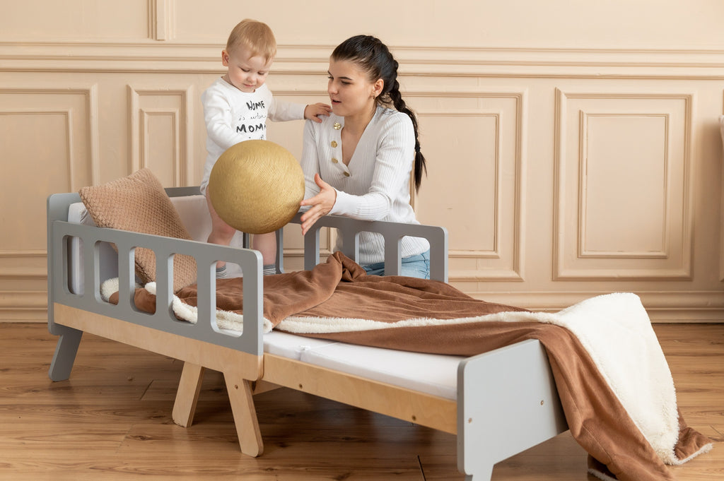 compact growing bed for kids folded into a cozy sofa for daytime play
