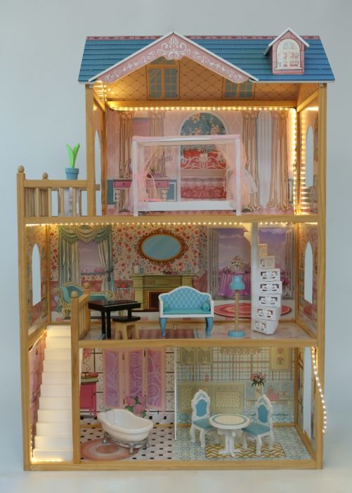 playful wooden dollhouse with glowing led lights illuminating the spiral staircase and furnished rooms