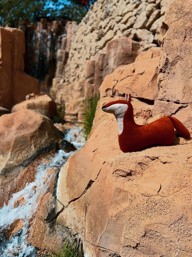 elegant handmade fox pillow with soft llama wool, shown in refined forest fox red