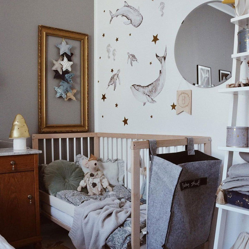 softly lit whale and seahorse wall stickers for a soothing nursery ocean theme