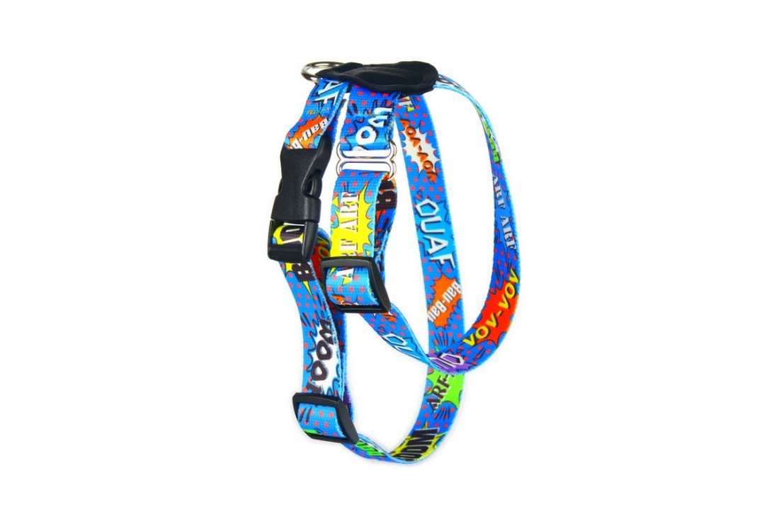 bold blue graffiti dog harness with leather accents shown in dramatic studio lighting